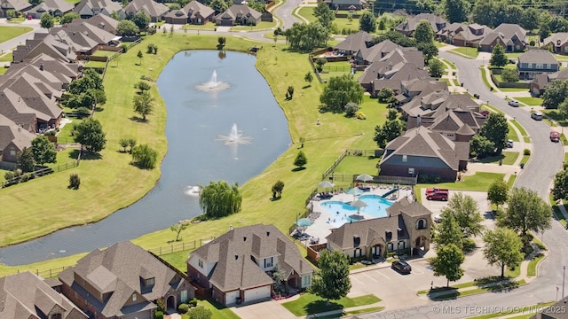 16410 E 49th St, Tulsa, OK 74134 - aerial view of residential area with a large body of water and a pool