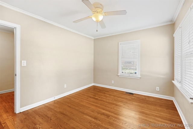 4247 S Owasso Ave, Tulsa, OK 74105 - unfurnished room with wood finished floors, a ceiling fan, and crown molding