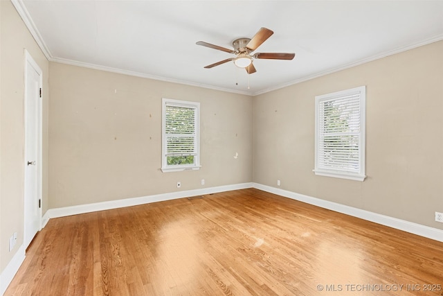 4247 S Owasso Ave, Tulsa, OK 74105 - empty room with healthy amount of natural light, ceiling fan, light wood finished floors, and ornamental molding
