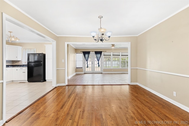 4247 S Owasso Ave, Tulsa, OK 74105 - unfurnished dining area featuring a chandelier, light wood-type flooring, ceiling fan, french doors, and ornamental molding