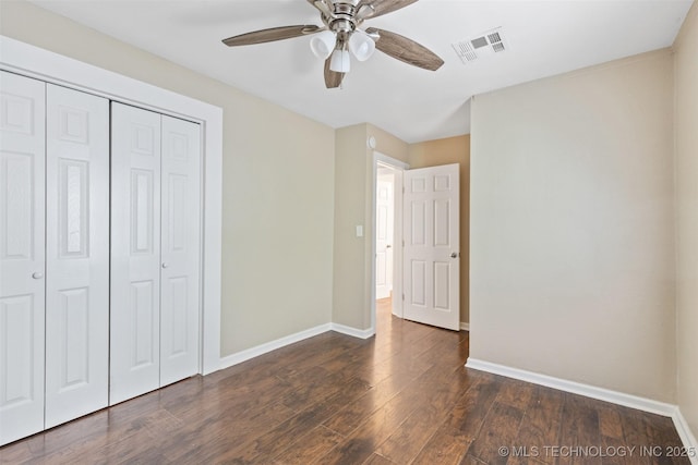 232 E Mohawk Blvd, Tulsa, OK 74106 - unfurnished bedroom with a closet, dark wood finished floors, and ceiling fan