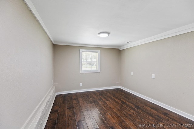 232 E Mohawk Blvd, Tulsa, OK 74106 - unfurnished room featuring crown molding and dark wood-style floors