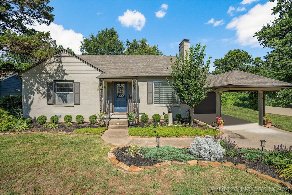 3202 S Detroit Ave, Tulsa, OK 74105 - ranch-style house featuring an attached carport, a chimney, a front lawn, and driveway