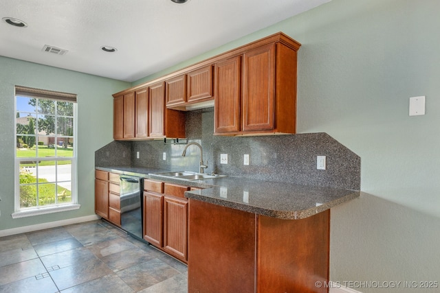 20409 E 49th St S, Broken Arrow, OK 74014 - kitchen with dishwasher, decorative backsplash, brown cabinetry, and recessed lighting