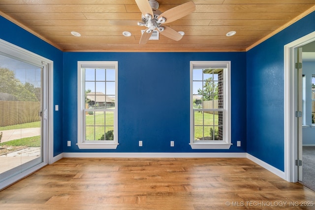 20409 E 49th St S, Broken Arrow, OK 74014 - spare room featuring wood ceiling, healthy amount of natural light, crown molding, wood finished floors, and ceiling fan