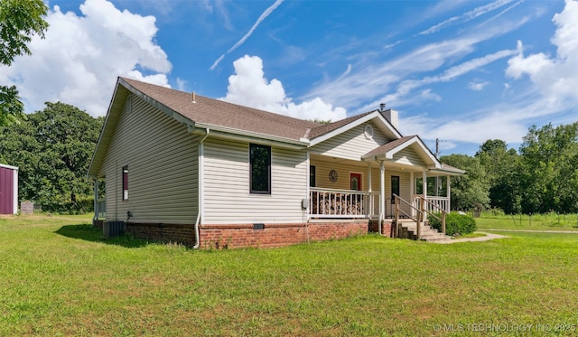 33966 S 4310th Rd, Big Cabin, OK 74332 - view of front of home with covered porch, a front lawn, a chimney, and roof with shingles