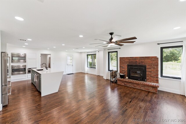 33966 S 4310th Rd, Big Cabin, OK 74332 - kitchen with appliances with stainless steel finishes, open floor plan, plenty of natural light, light countertops, and recessed lighting