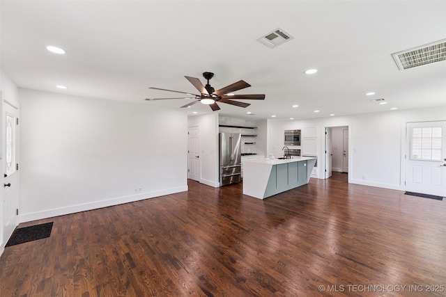 33966 S 4310th Rd, Big Cabin, OK 74332 - unfurnished living room featuring recessed lighting, ceiling fan, and dark wood-style floors