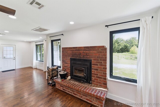 33966 S 4310th Rd, Big Cabin, OK 74332 - living area featuring wood finished floors, a brick fireplace, and recessed lighting