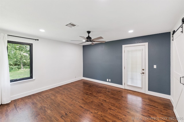 33966 S 4310th Rd, Big Cabin, OK 74332 - spare room featuring a barn door, ceiling fan, recessed lighting, and wood finished floors