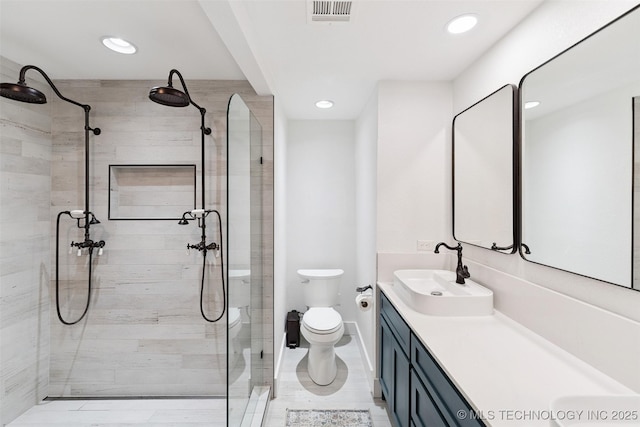 33966 S 4310th Rd, Big Cabin, OK 74332 - bathroom featuring double vanity, a tile shower, and recessed lighting