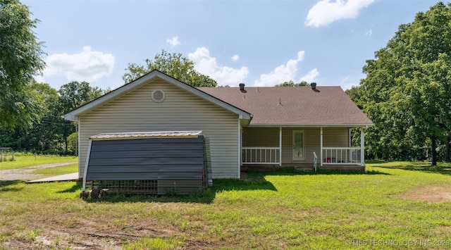33966 S 4310th Rd, Big Cabin, OK 74332 - view of front facade with covered porch, a front yard, and roof with shingles