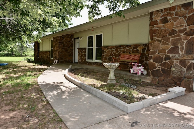 27855 S 170th Rd, Henryetta, OK 74437 - property entrance featuring stone siding
