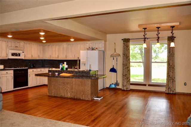 27855 S 170th Rd, Henryetta, OK 74437 - kitchen featuring white appliances, decorative backsplash, dark countertops, dark wood-type flooring, and recessed lighting
