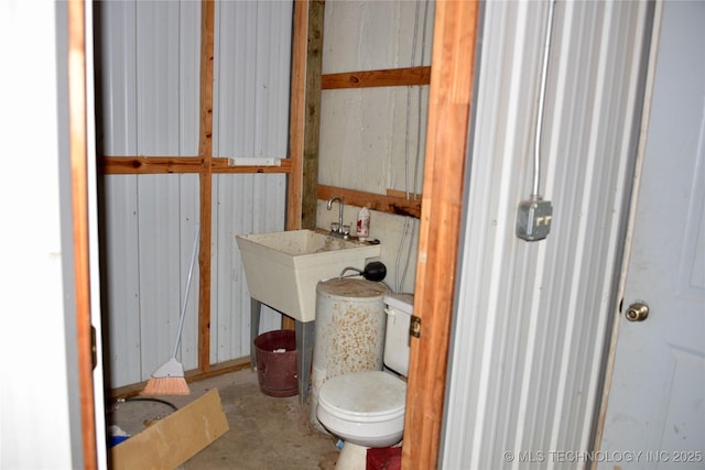 27855 S 170th Rd, Henryetta, OK 74437 - bathroom with unfinished concrete flooring and toilet