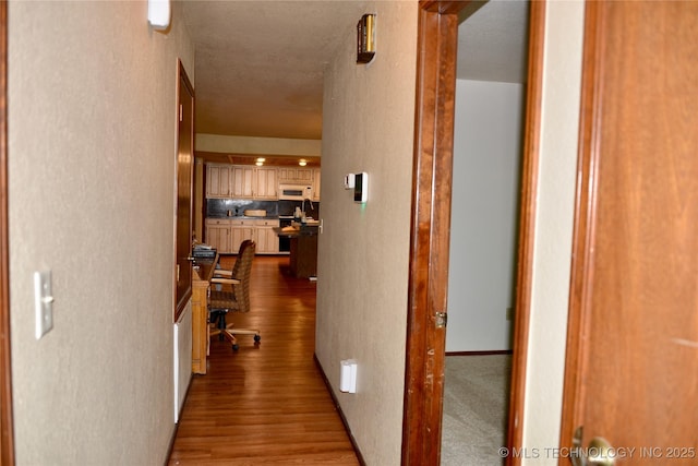27855 S 170th Rd, Henryetta, OK 74437 - hall featuring dark wood-style floors and a textured wall