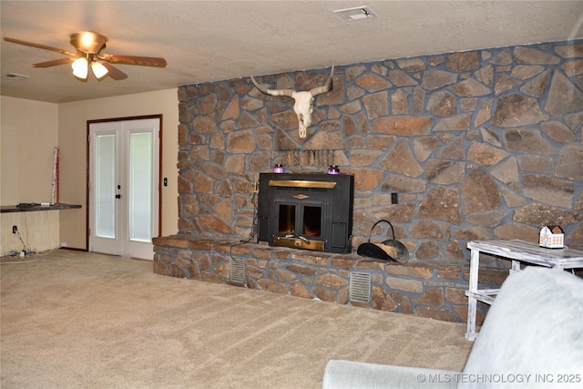 27855 S 170th Rd, Henryetta, OK 74437 - unfurnished living room featuring carpet flooring, ceiling fan, and a textured ceiling