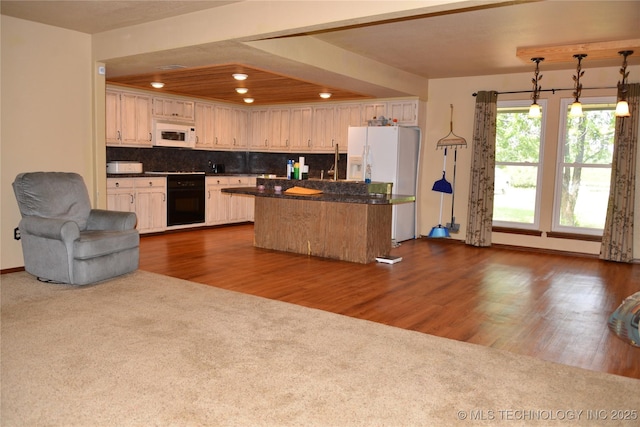 27855 S 170th Rd, Henryetta, OK 74437 - kitchen featuring white appliances, dark countertops, backsplash, recessed lighting, and a center island
