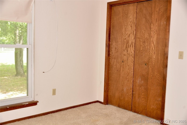 27855 S 170th Rd, Henryetta, OK 74437 - unfurnished bedroom with carpet and a closet