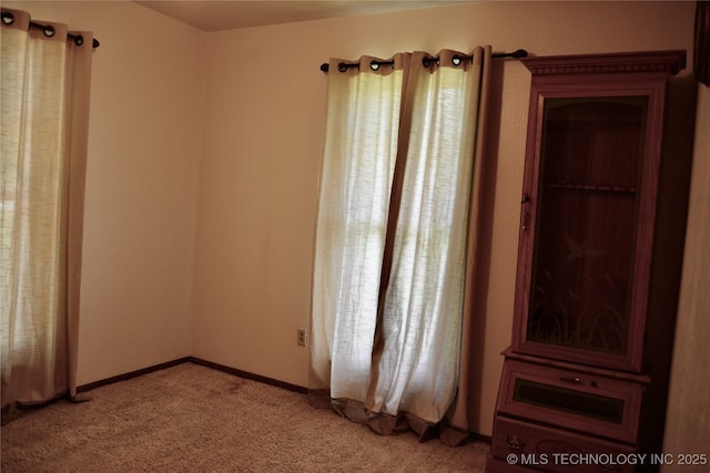 27855 S 170th Rd, Henryetta, OK 74437 - unfurnished bedroom with light colored carpet