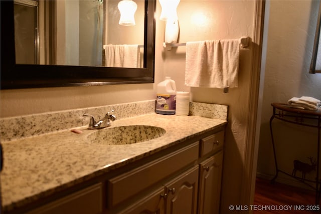 27855 S 170th Rd, Henryetta, OK 74437 - bathroom featuring vanity and wood finished floors