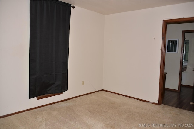27855 S 170th Rd, Henryetta, OK 74437 - spare room featuring carpet flooring