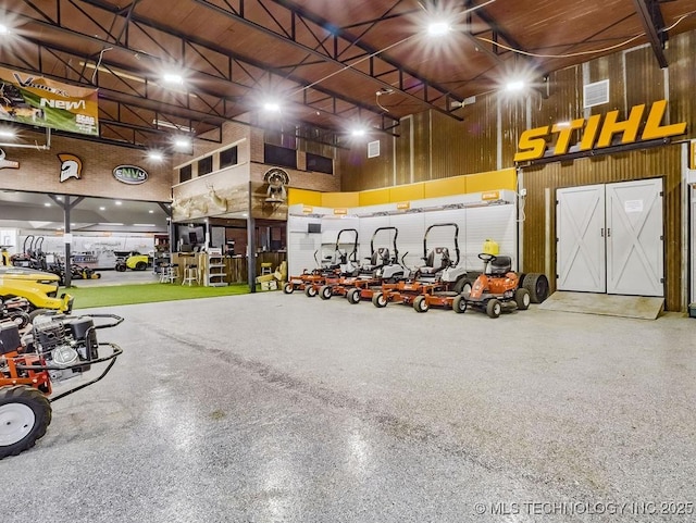 824 S California, Atoka, OK 74525 - garage featuring wooden walls