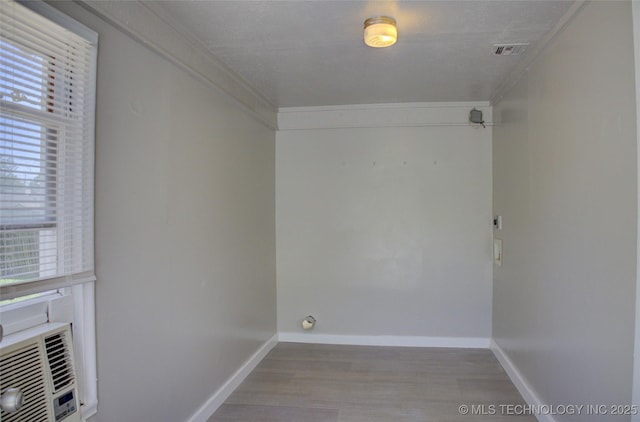 3833 E 22nd St, Tulsa, OK 74114 - spare room featuring wood finished floors and baseboards