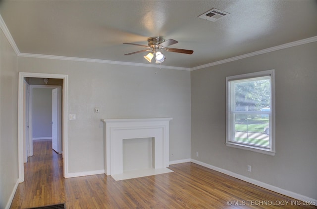 3833 E 22nd St, Tulsa, OK 74114 - unfurnished living room with a ceiling fan, wood finished floors, and ornamental molding