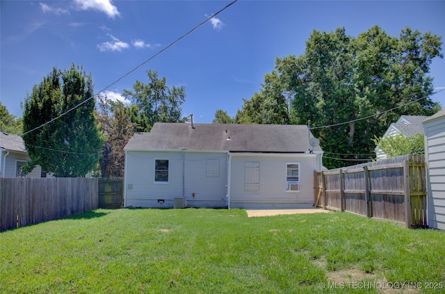 3833 E 22nd St, Tulsa, OK 74114 - back of property featuring a fenced backyard, crawl space, and a patio area