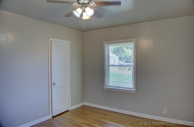 3833 E 22nd St, Tulsa, OK 74114 - unfurnished room featuring ceiling fan and wood finished floors