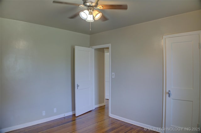 3833 E 22nd St, Tulsa, OK 74114 - spare room with a ceiling fan and wood finished floors