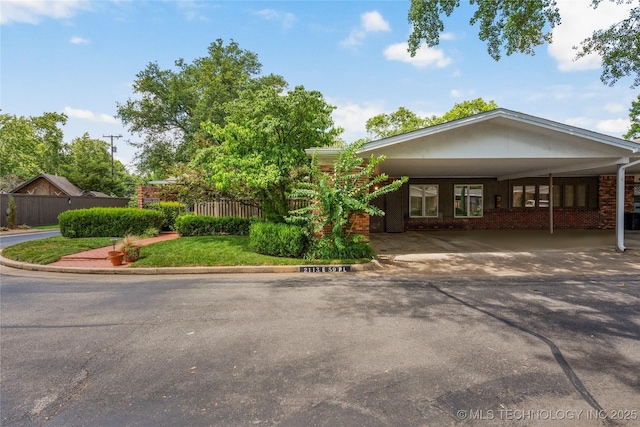 view of front of house featuring an attached carport