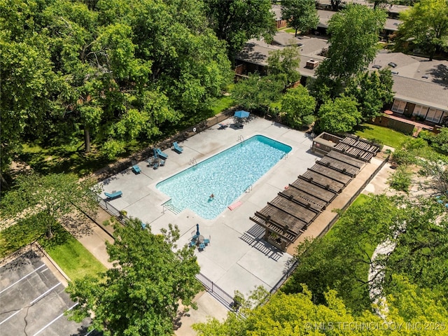 drone / aerial view of a pool area
