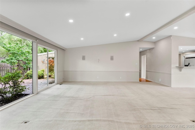 spare room with light colored carpet and recessed lighting