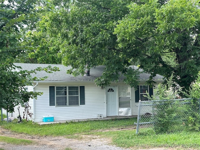 200 W Polk, Mcalester, OK 74501 - view of front facade featuring roof with shingles