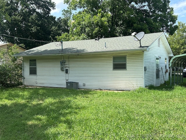 200 W Polk, Mcalester, OK 74501 - rear view of house with a lawn and roof with shingles