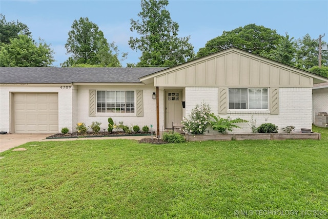 4706 S Madison Ave, Tulsa, OK 74105 - ranch-style house with brick siding, board and batten siding, an attached garage, and a front yard