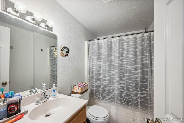 1105 S Maple Ave, Tahlequah, OK 74464 - bathroom featuring a textured wall, vanity, a textured ceiling, and curtained shower