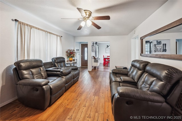 1105 S Maple Ave, Tahlequah, OK 74464 - living room featuring a ceiling fan and wood-type flooring