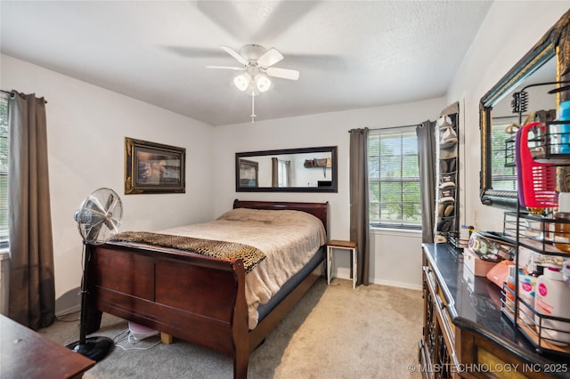 1105 S Maple Ave, Tahlequah, OK 74464 - bedroom featuring light carpet and a ceiling fan