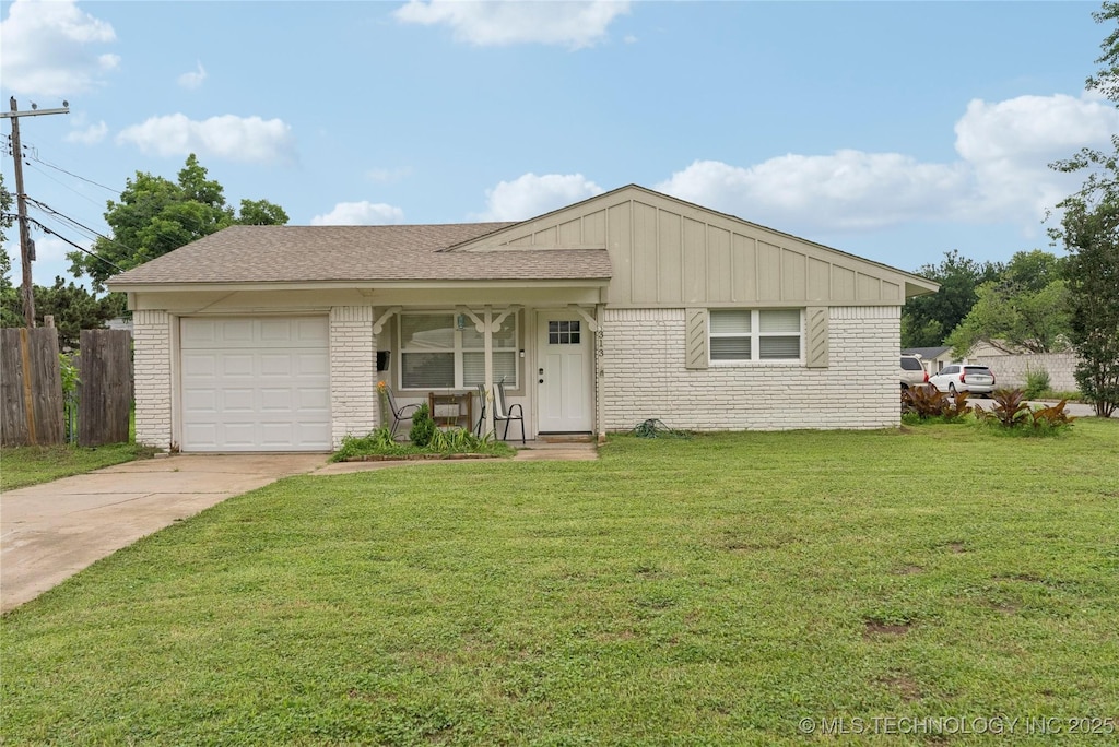313 E 48th Ave, Tulsa, OK 74105 - view of front facade featuring brick siding, concrete driveway, an attached garage, covered porch, and board and batten siding