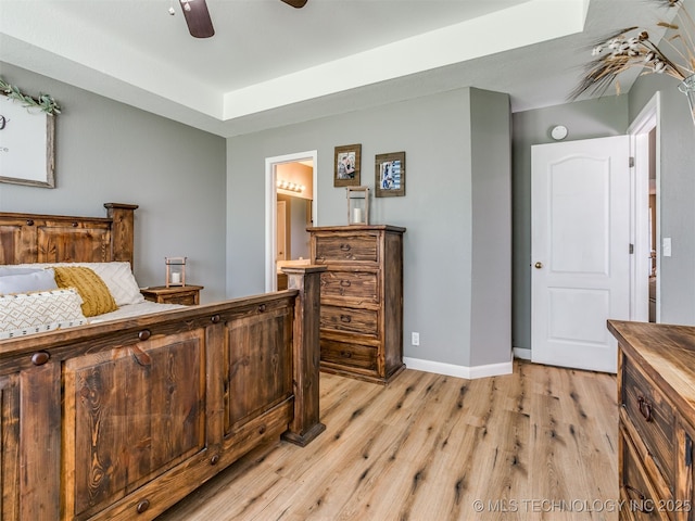1604 W Los Angeles Cir, Broken Arrow, OK 74011 - bedroom featuring light wood-style floors, ensuite bathroom, and ceiling fan