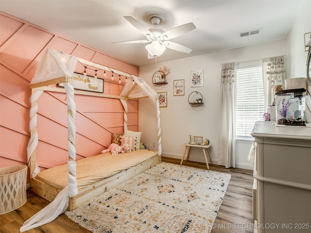 1604 W Los Angeles Cir, Broken Arrow, OK 74011 - bedroom with wood finished floors and a ceiling fan