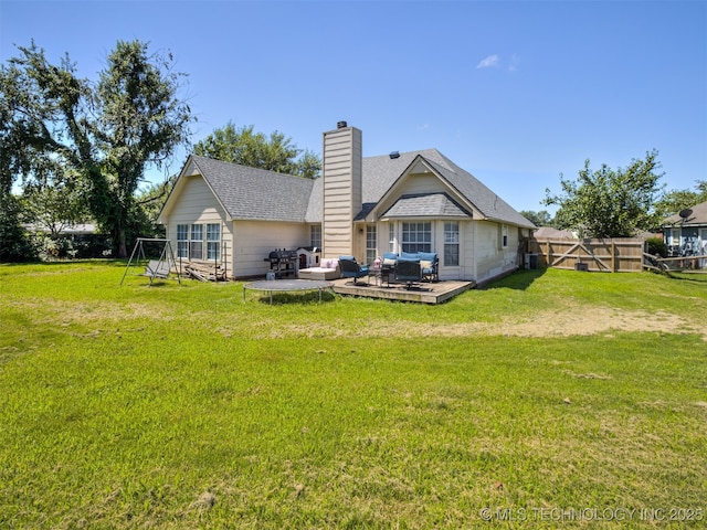 1604 W Los Angeles Cir, Broken Arrow, OK 74011 - back of house with an outdoor hangout area, a wooden deck, a chimney, and roof with shingles