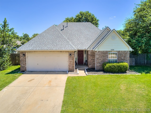 1604 W Los Angeles Cir, Broken Arrow, OK 74011 - view of front of property with a garage, concrete driveway, brick siding, and a shingled roof