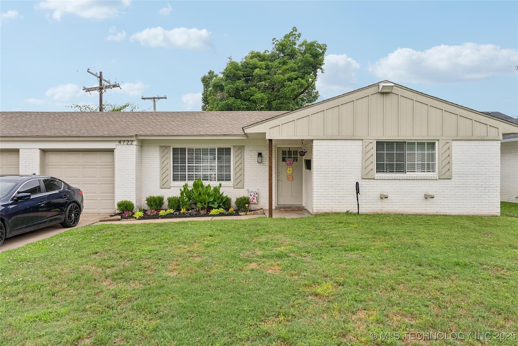 4722 S Madison Ave, Tulsa, OK 74105 - ranch-style house featuring a garage, brick siding, a front yard, and board and batten siding
