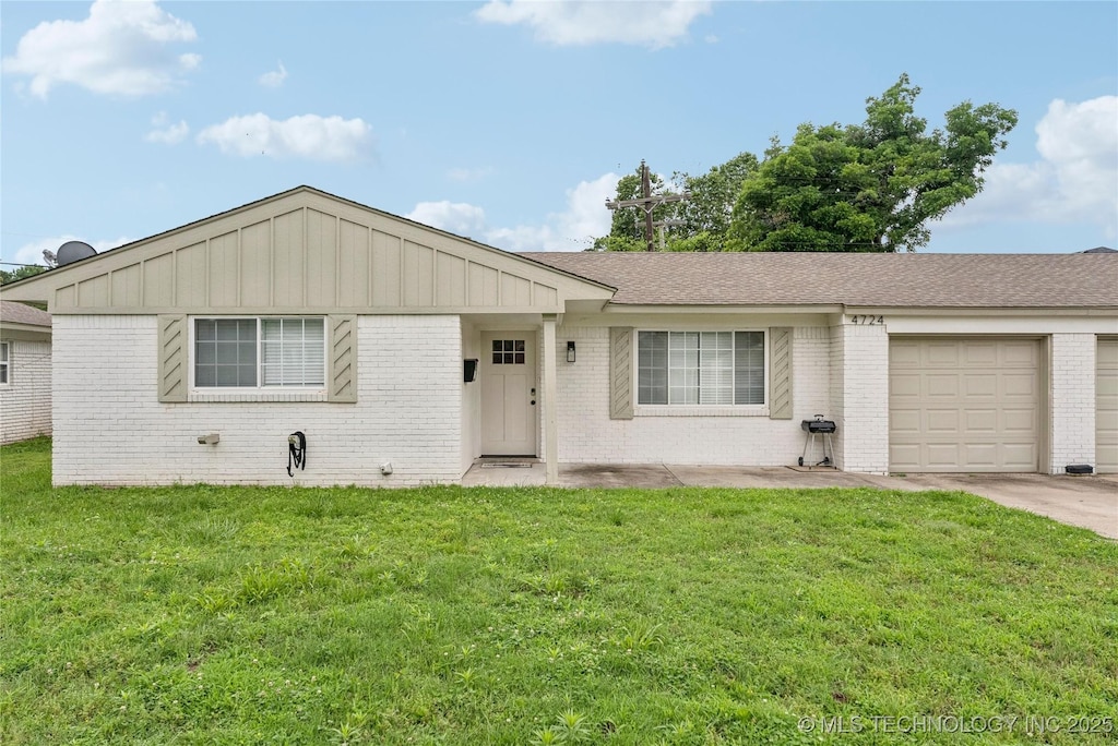 4722 S Madison Ave, Tulsa, OK 74105 - ranch-style home featuring brick siding, a garage, board and batten siding, a front lawn, and driveway