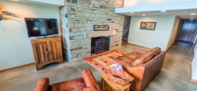 117189 S 4238th Rd, Eufaula, OK 74432 - living area featuring a stone fireplace, concrete floors, and recessed lighting
