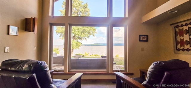 117189 S 4238th Rd, Eufaula, OK 74432 - entryway featuring a water view, healthy amount of natural light, and a towering ceiling